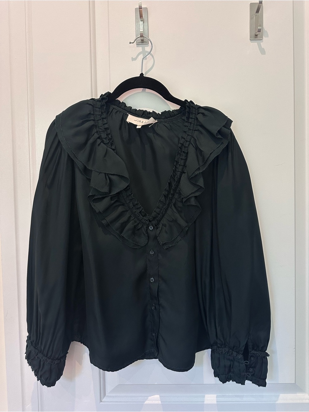 Ruffled V-Neck Button-Front Blouse